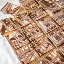 Load image into Gallery viewer, Pieces of tiger butter in lines